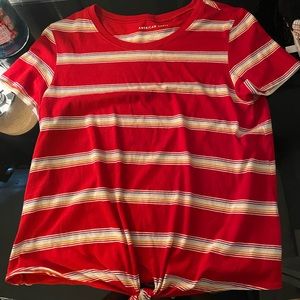 Red shirt with rainbow stripes